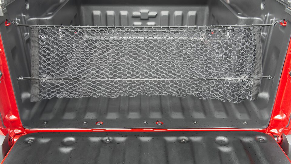 Organiza tu caja de carga con la red vertical para Chevrolet Montana 2025